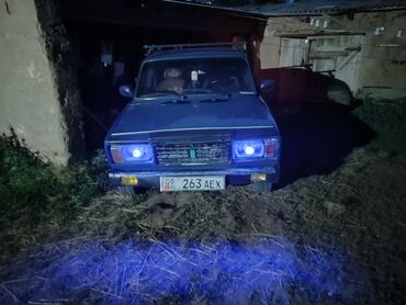 диски на ниву б у: Автомобиль ВАЗ-2107 синего цвета, оснащенный багажником на крыше для