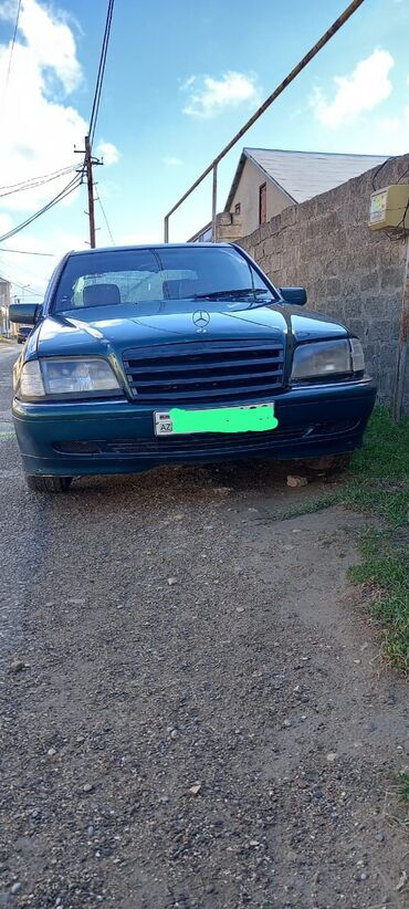 mercedes karopka: Mercedes-Benz C 200: 2.2 l | 1995 il Sedan