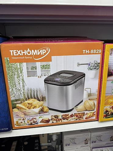 Хлебопечка Техномир TH-8829 - Корпус из нержавеющей стали, крышка с