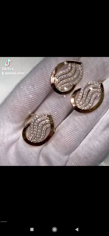 коплект: Серебро с золотом 925 пробы Камни Фианиты Размеры имеются Есть