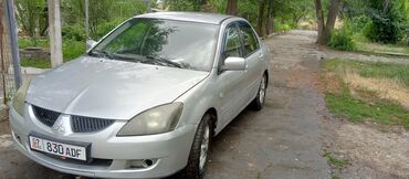 Mitsubishi: Серебристый седан Mitsubishi Lancer с четырехдверным кузовом, идеально — 2