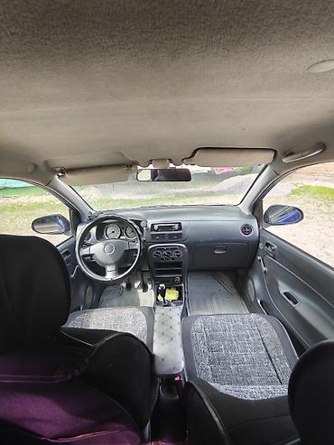 1: Daihatsu Cuore: 2003 г., 1 л, Механика, Бензин, Хэтчбэк — 5