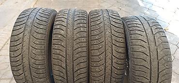 ско: Шины 235 / 55 / R 18, Зимняя шипованная, Б/у, Комплект, Легковые, Bridgestone — 1