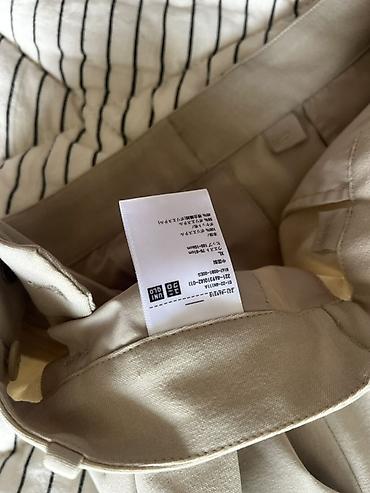 Шымдар: Классические брюки Uniqlo, бежевые (теплый светло-песочный оттенок) — 2