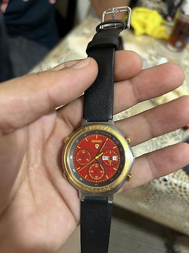 Ferrari: Ferrari brendli qol saatı - Rəng: qırmızı siferblat, qızılı bezel at lalafo.az — 1 Ferrari: Ferrari brendli qol saatı - Rəng: qırmızı siferblat, qızılı bezel — 1