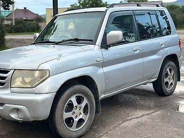 Унаа: Mitsubishi Pajero iO: 2003 г., 2 л, Автомат, Бензин, Жол тандабас — 2