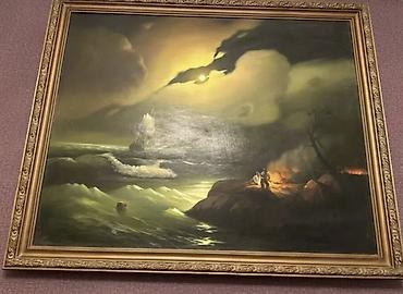 Çərçivəli dekorativ tablo təqdim olunur. Əsərdə dramatik dəniz