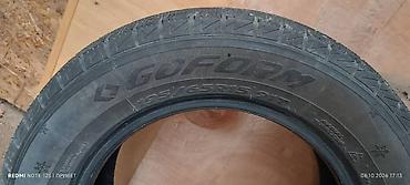 Зимние шины GOFORM 195/65 R15 91T. На фото видны шины с направленным