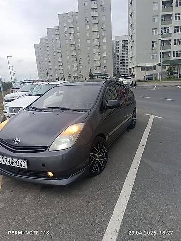 prius salon: Toyota Prius (2-ci nəsil) hibrid hetçbek - Kuzov: hetçbek, tünd boz — 4