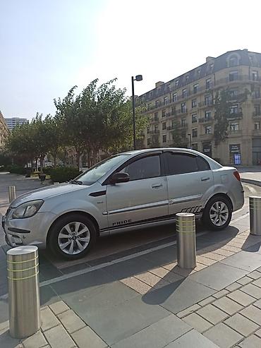 daewoo nexia 2009: Kia Rio: 1.5 l | 2010 il Sedan — 3
