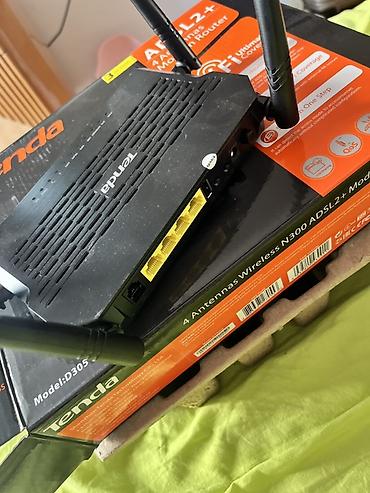 Modemlər və şəbəkə avadanlıqları: Tenda D305 ADSL2+ Wi‑Fi marşrutlaşdırıcı Xüsusiyyətlər: - 4 ədəd — 2