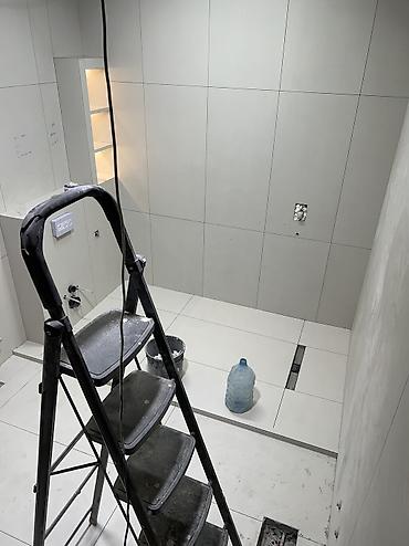 услуги строительно отделочных работ: Укладка керамической плитки в ванной комнате под ключ - Вертикальная — 8