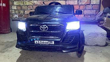 купить детскую игрушку машинку: Детский электромобиль Toyota (стилизованный под внедорожник) - Кузов — 1
