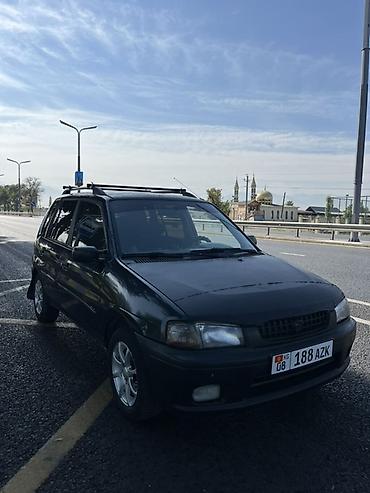 Mazda Demio: 1999 г., 1.3 л, Хэтчбэк