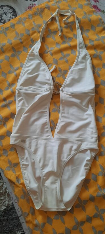 new yorker kupaći kostimi srbija: SPIDO kupaći, potpuno nov, nije skinuta zaštita,vel. 42. Vezuje se oko