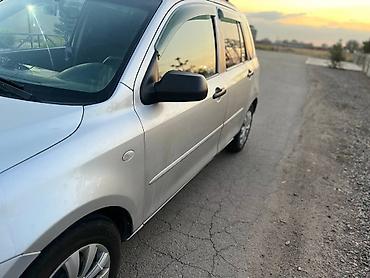 мата секыл: Mazda 2: 2003 г., 1.3 л, Кол менен иштөөчү, Бензин, Хетчбек — 6