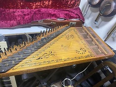 saz aparatlari: Məhsul: Kanon (Qanun) musiqi aləti Təsvir: - Şərq musiqisinə aid — 1