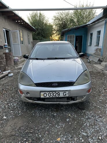 посадка машины: Ford Focus: 1998 г., 1.9 л, Механика, Бензин, Купе