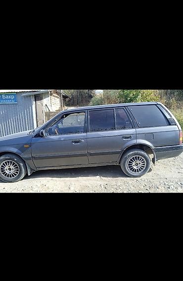 Mazda 323: 1994 г., Бензин, Универсал — 2