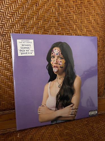 vu: Məhsul: “SOUR” – vinil LP (Parental Advisory) Təsvir: - Müğənni — 1