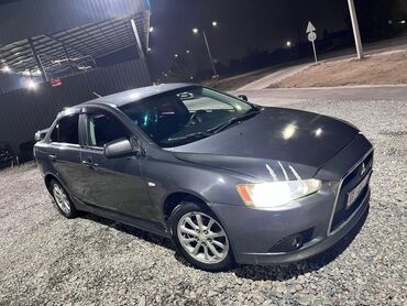 шины на масквич: Mitsubishi Lancer: 2010 г., 1.5 л, Автомат, Бензин, Седан