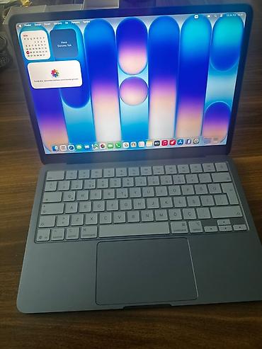 2.el macbook: Apple MacBook Air A3404 modeli təqdim olunur. Cihazın alt hissəsindəki — 1