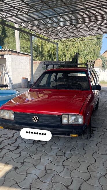 пружина пассат б3: Универсал Volkswagen Passat красного цвета, оснащенный багажником на
