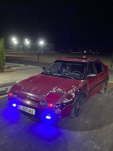 rgb свет: Mazda 323: 1990 г., 1.6 л, Механика, Бензин, Хэтчбэк — 9