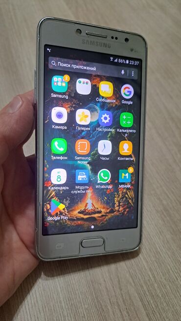 мобильные телефоны в кредит: Samsung Galaxy Grand, цвет - Серебристый, 2 SIM