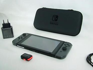 Nintendo Switch: Uz konzolu dolazi: Tablet (konzola) Joy-Con džojstici Punjač — 1