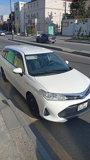 bort baqaj: Toyota Corolla Fielder Hybrid, ağ rəng, universaI kuzov. Texniki — 3