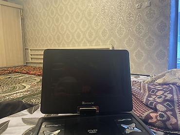 ТВ и видео: Портативный DVD/EVD-плеер SONCM с поворотным экраном. Особенности: - — 2