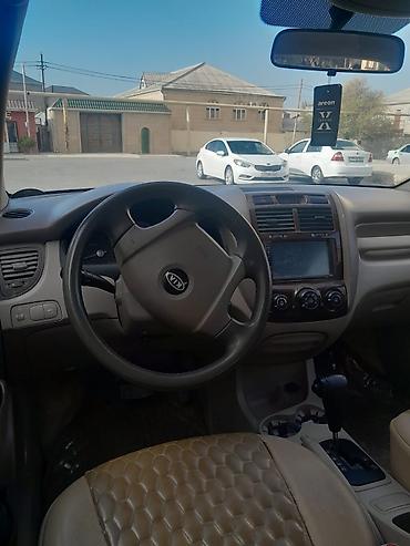 cherry masin: Kia Sportage – qara rəngli, şəhər və yolsuzluq üçün əlverişli kompakt — 2
