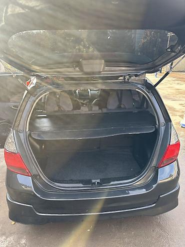 газ уста: Honda Jazz: 2005 г., 1.3 л, Автомат, Бензин, Хетчбек — 9