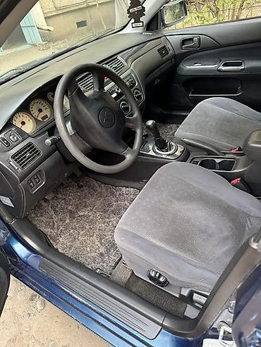 митсубиси делка: Mitsubishi Lancer: 2004 г., 1.8 л, Механика, Бензин, Седан — 8
