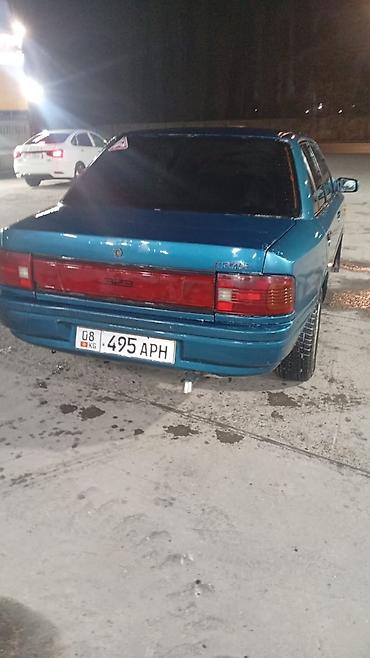 5: Mazda 323: 1991 г., 1.5 л, Механика, Бензин, Седан — 4