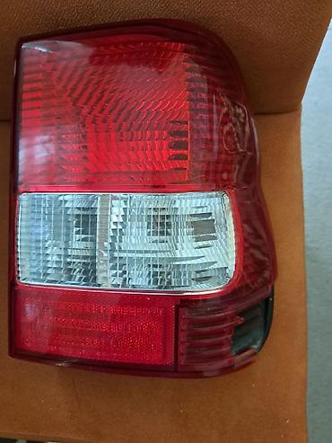 ford 1998: Mitsubishi io Arxa sağ tərəf üçün avtomobil stop/fara. qırağı — 1