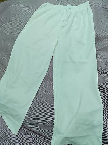 kofta qadin: Ağ rəngli rahat şalvar - Model: geniş kəsimli, düz paça - Material — 2