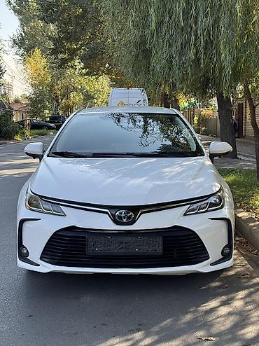 corolla 2016: Toyota Corolla: 2021 г., 1.8 л, Вариатор, Гибрид, Седан — 9