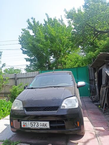 самые дешевые машины: Daihatsu Cuore: 2003 г., 1 л, Механика, Бензин, Хетчбек