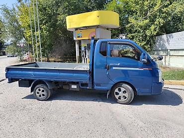 h 100: Hyundai Porter II (бортовой малотоннажный грузовик), синий цвет. - — 4