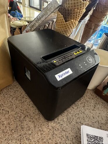 совместимые расходные материалы lamimark черно белые картриджи: Xprinter, выполненный в черном цвете, представляет собой компактное