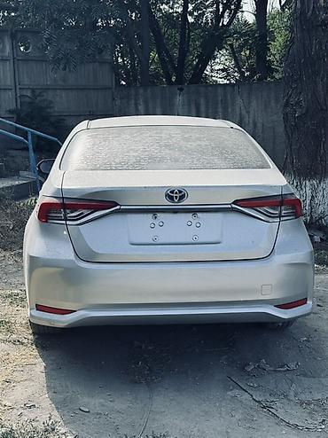 byd e1: Toyota Corolla: 2021 г., 1.8 л, Вариатор, Гибрид, Седан — 3