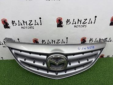 Решетка радиатора Mazda 2002 г., Б/у, Оригинал