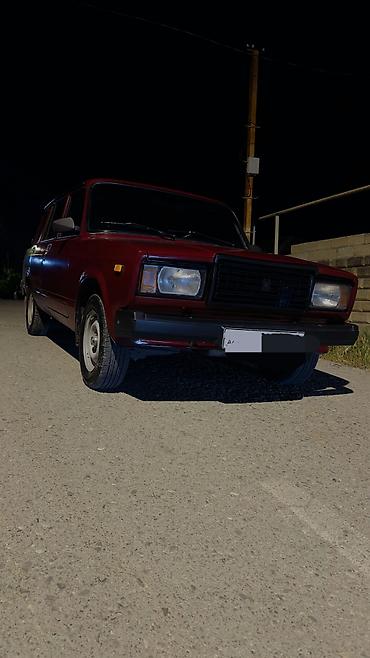 опель зафира а: VAZ 2104, qırmızı rəng, universal kuzov. Xüsusiyyətlər: - Arxa — 4