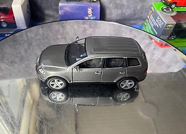 Avtomobil modelləri: Коллекционная модель volkswagen touareg grey metallic 2003 kinsmart — 13