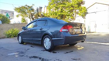 Honda: Honda Civic: 1.3 l | 2006 il Sedan — 2