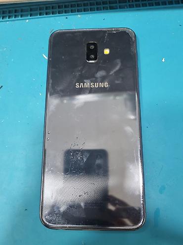 s20 plus: Samsung Galaxy J6 Plus, rəng - Qara, Barmaq izi — 1