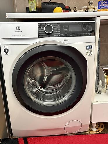 silver dondurucu: Electrolux PerfectCare 700 buxarlı paltaryuyan (yuma+qurudma) - Ön — 1