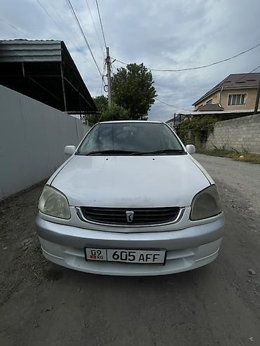 вум ау: Toyota Raum: 2002 г., Бензин, Минивэн — 1